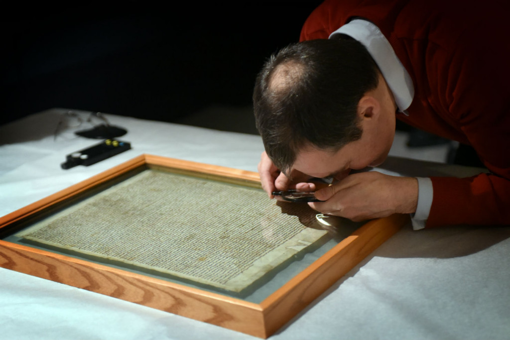 Magna Carta being prepared for display at the British Library (photo: Clare Kendall) 